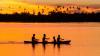 Family with children canoeing