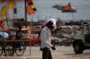 A man walking through heatwave in Prayagraj, India 